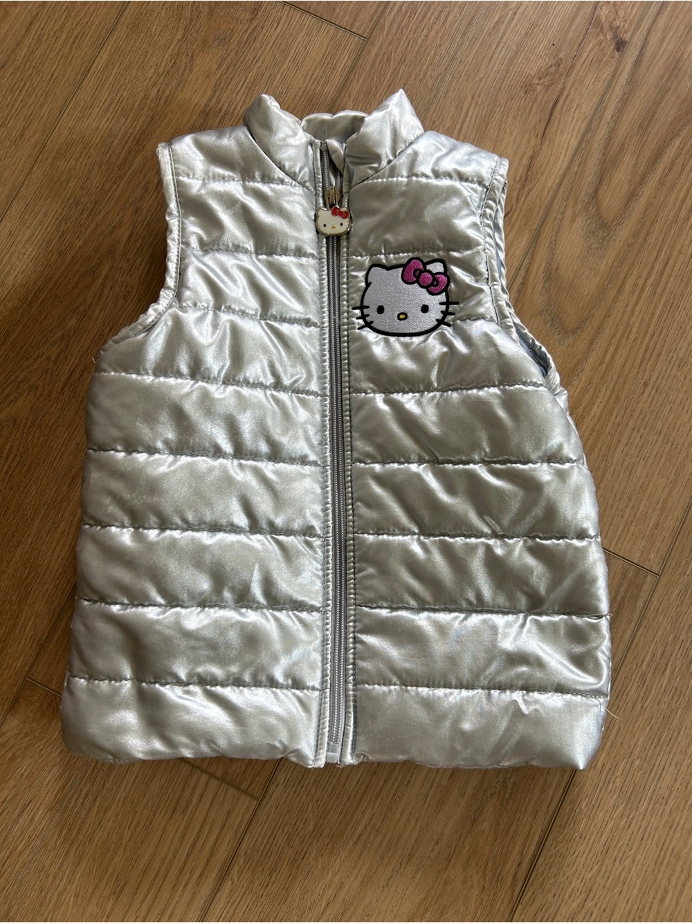 Sanrio Silver Hello Kitty Puffer Vest with Pink Bow Accent